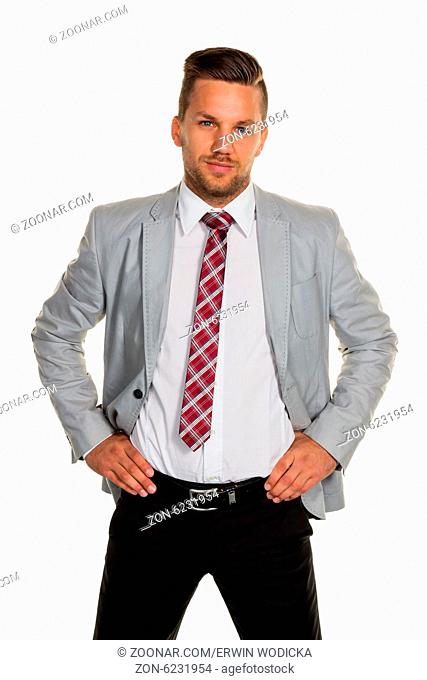 Ein Mann ( Manager oder Unsternehmer ) steht vor einem weißen Hintergrund