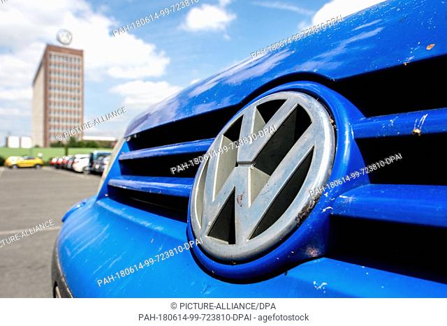 14 June 2018, Germany, Wolfsburg: The VW logo on a Golfo car. The public prosecution commented on further developments of the diesel affair during a press...