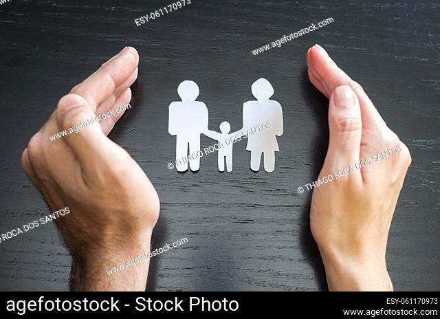Great concept of family and protection . with the hands