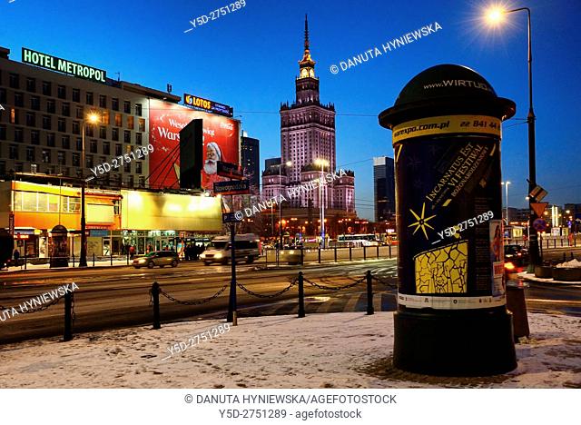 Warsaw center at night, in background Palace of Culture and Science, crossroad of Marszalkowska street and Nowogrodzka street, Srodmiescie district, winter