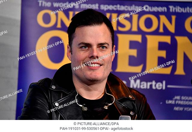 31 October 2019, North Rhine-Westphalia, Cologne: The musician Marc Martel plays and sings at the press conference for the tour of the show One Vision of Queen...