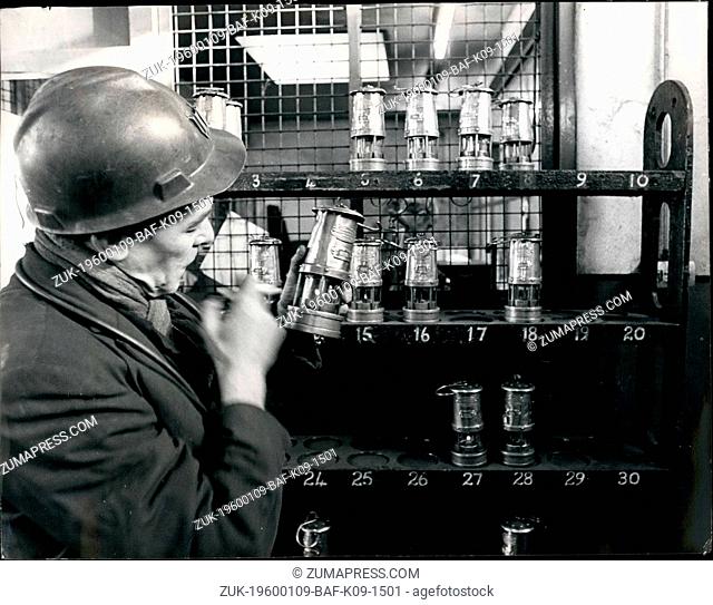 1964 - A miner from the Lady Windsor colliery, Wales tests his lamp for gas before staring his shift. Confrontation Continues: The crippling threat to Britain's...