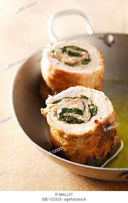 Veal escalope rolls filled with spinach and raw ham