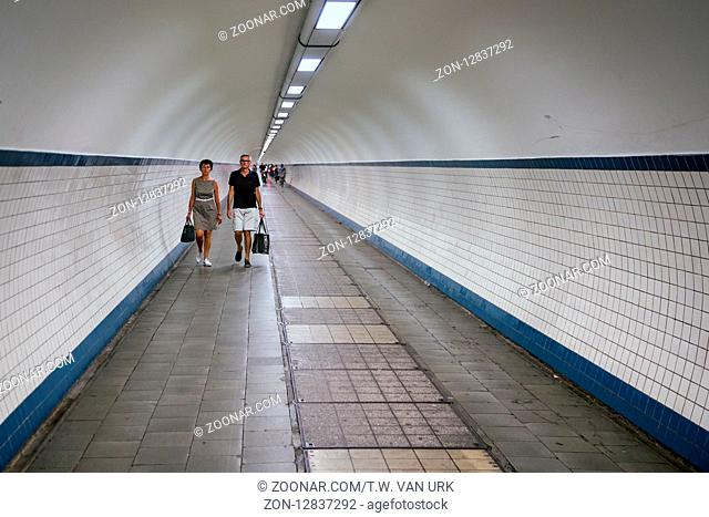 ANTWERP, BELGIUM - AUG 11: Pedestrians passing a hiking tunnel under river Schelde in the city Antwerp on August 11, 2015 in Antwerp, Belgium