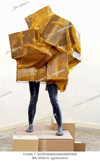 Statue, head and torso hidden under boxes, sculpture by Alexandra Polonskaja, exhibition of student works, Kunstakademie Duesseldorf arts academy