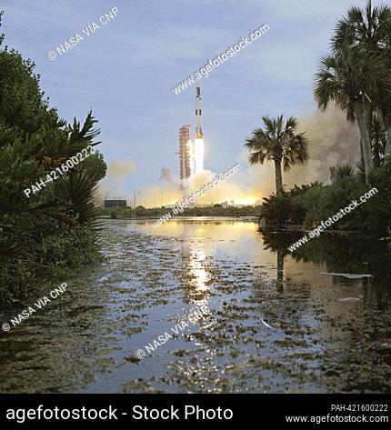Clouds of smoke billow out over the surrounding area as the uncrewed Skylab 1/Saturn V space vehicle launches from NASA’s Kennedy Space Center on May 14, 1973