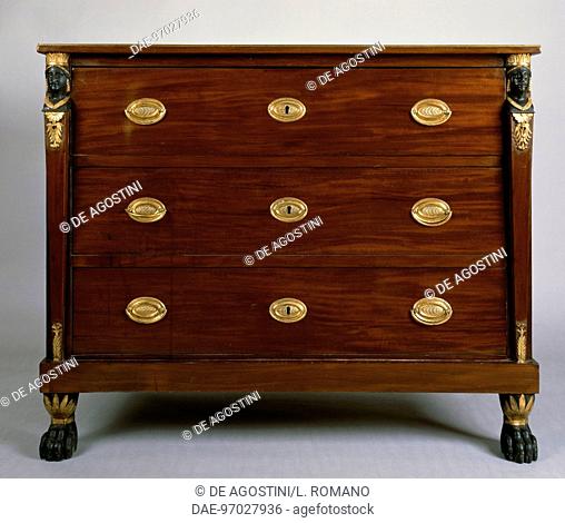 Empire style Tuscan chest of drawers with mahogany veneer finish and gilt wood carved columns, 1810. Italy, 19th century.  Private Collection