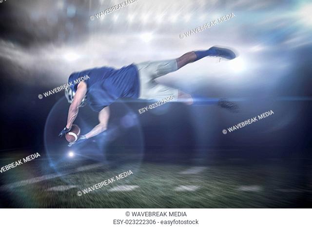 Composite image of american football player catching ball in mid-air