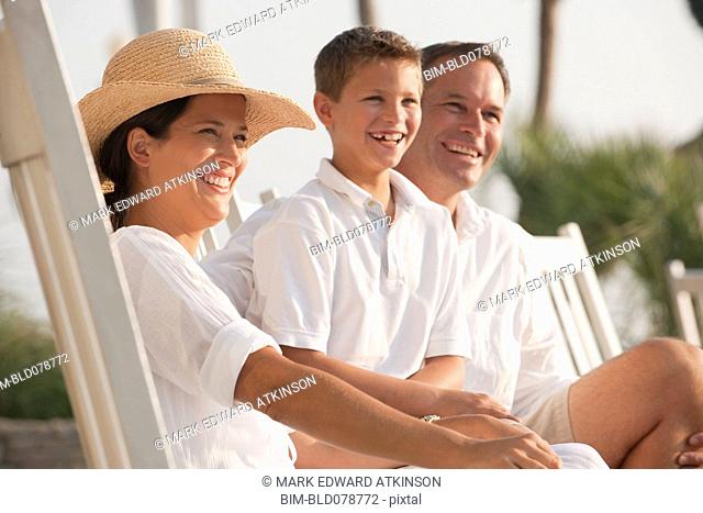 Caucasian family laughing together