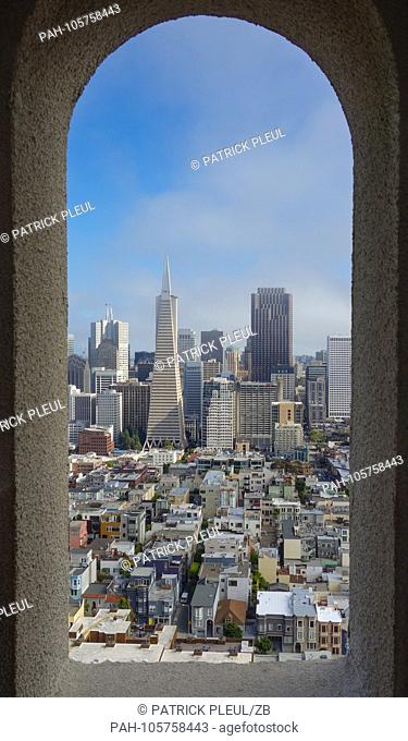 01.06.2017, USA, San Francisco: View of San Francisco on the Transamerica Pyramid (withte left). It is a landmark of the city on the West Coast