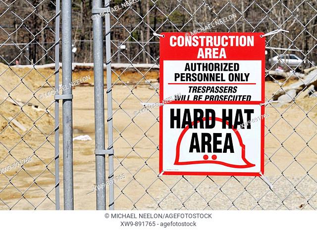 Construction site warning sign hard hat area, authorized personnel only, trespassers will be prosecuted
