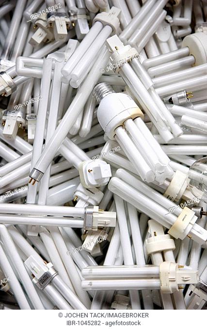 Damaged and discarded fluorescent low-energy lamp tubes for disposal at a recycling yard, Germany