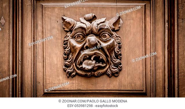 Italy, Turin. This city is famous to be a corner of two global magician triangles. This is a protective mask of stone on the top of a luxury palace entrance