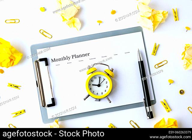 Monthly goals planner on white background. Planning month to stay productive when working from home during quarantine period. Flat lay. Top view