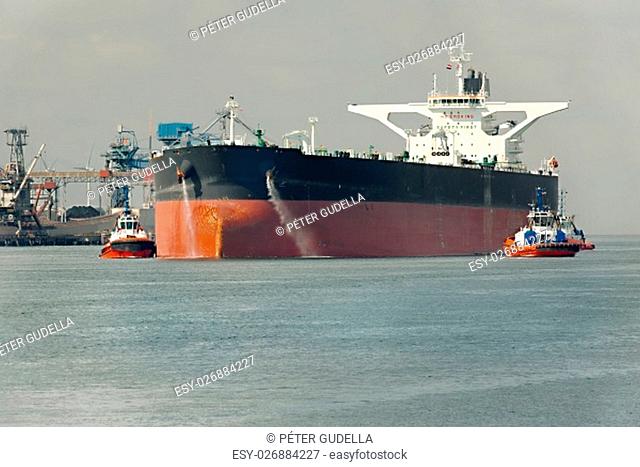 Large crude oil tanker ship coming into port