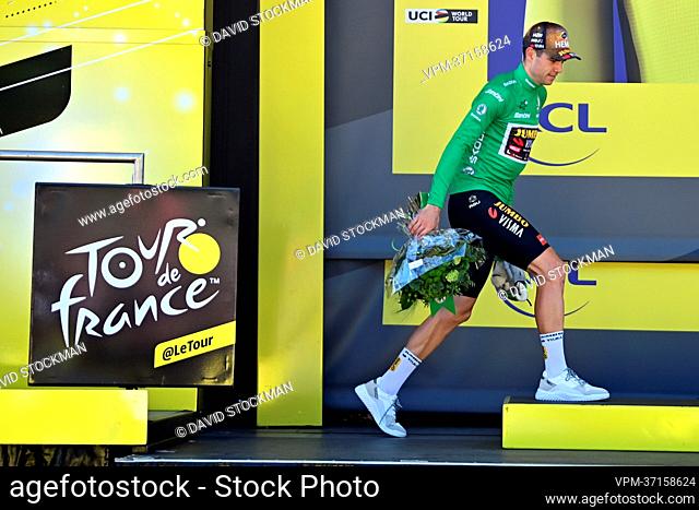 Belgian Wout Van Aert of Team Jumbo-Visma celebrates in the green jersey of leader in the points ranking after stage eight of the Tour de France cycling race