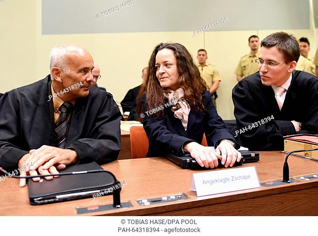 The defendant Beate Zschaepe sits between her lawyers Hermann Borchert (L) and Mathias Grasel (R) in the courtroom of the higher regional court in Munich