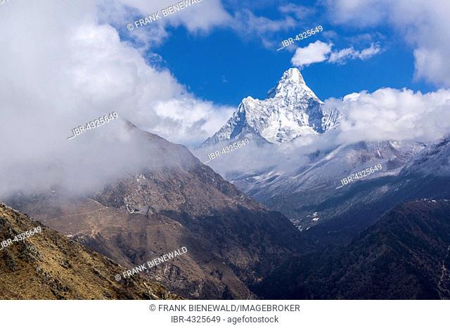 Ama Dablam (6856m) mountain framed by clouds, Mong La, Solo Khumbu, Nepal