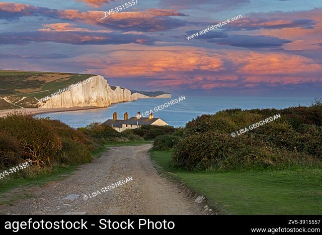 The Seven Sisters and Coastguard Cottages at sunset. Seaford, East Sussex, UK