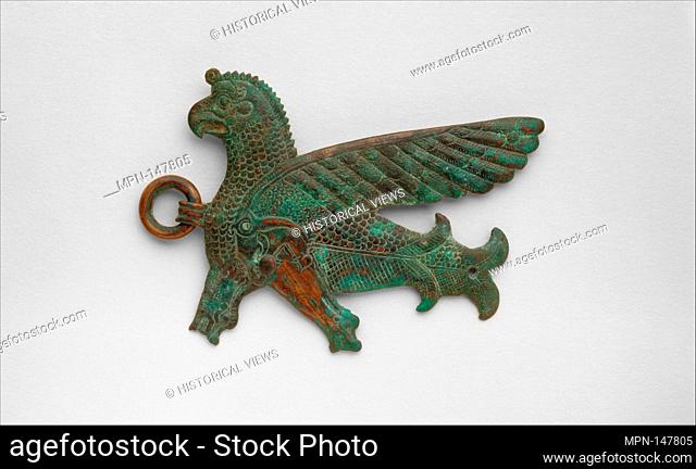 Belt ornament in the form of a bird demon. Period: Iron Age III; Date: ca. late 8th-7th century B.C; Geography: Urartu; Culture: Urartian; Medium: Bronze;...