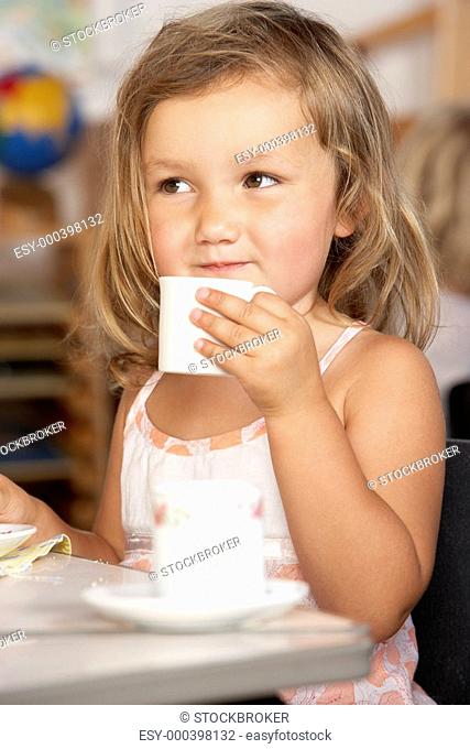 Young Boy Having Tea at Montessori/Pre-School