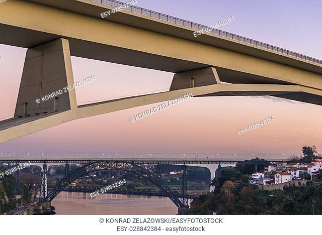 View on three bridges connecting Porto and Vila Nova de Gaia: Infante D. Henrique Bridge and railway bridges Maria Pia (old) and Saint John, Portugal