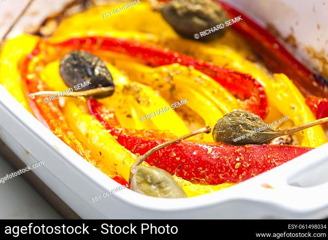 baked red and yelllow peppers with capers