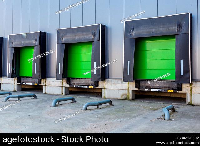 Green loading ramp doors for loading trruck at a distribution center