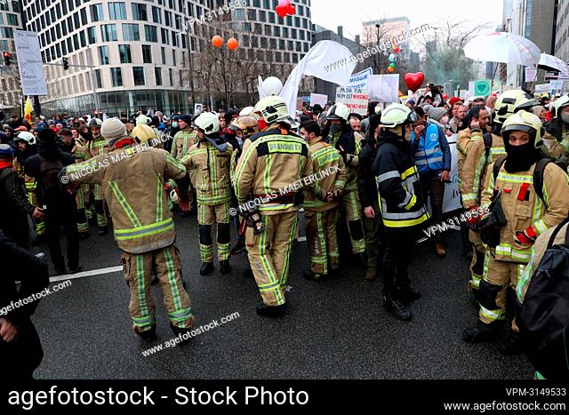 Firefighters pictured during a protest against the health pass (Marche pour la Liberte Acte 2 - Mars voor Vrijheid Act 2) and other corona measures, in Brussels