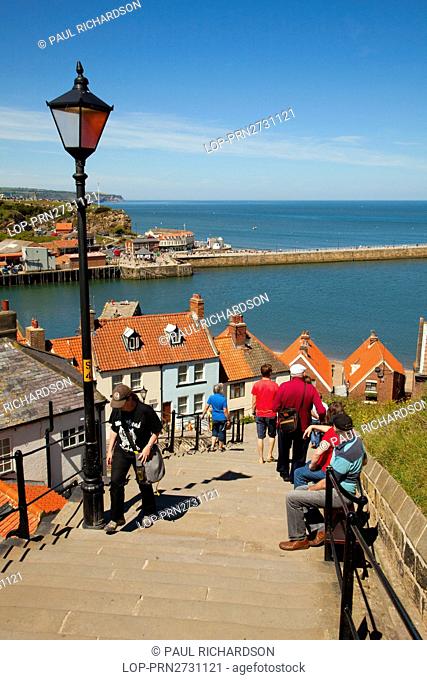 England, North Yorkshire, Whitby. The 199 steps leading from the harbour to Whitby Abbey