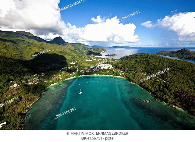 The coast of Pointe L'escalier, NYS Village in the back, Island of Mahe, Seychelles, Indian Ocean, Africa