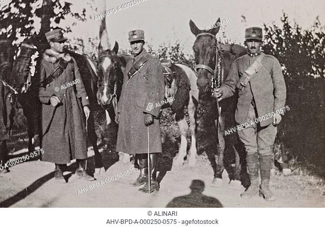 Album Campagna di guerra 1915-1916-1917-1918, tenente Jack Bosio: soldiers with horses during the retreat from the Tagliamento, shot 11/1917