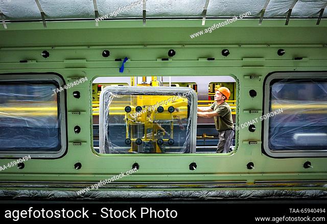 RUSSIA, SVERDLOVSK REGION - DECEMBER 19, 2023: Assembling Lastochka ES104 high-speed electric train carriages at the Ural Locomotives plant in the town of...