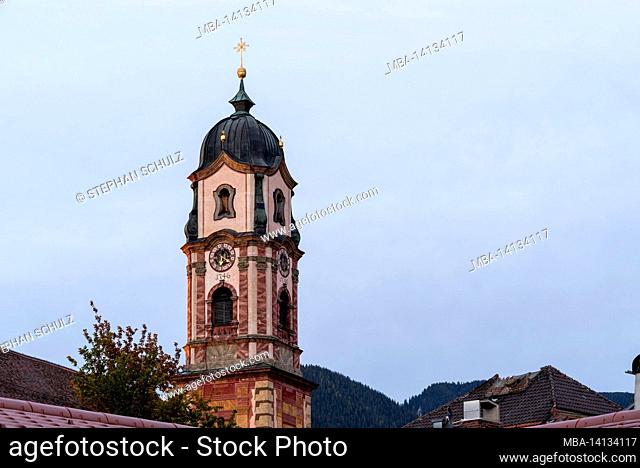 church of st. peter and paul at dusk, mittenwald, upper bavaria, bavaria, germany