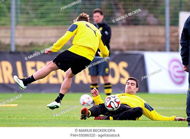 Borussia Dortmund players Jon Gorenc Stankovic (L) and Sokratis in action during a training session in La Manga, Spain, 16 January 2015