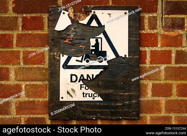 Damaged Sign: Danger forklift trucks, seen in Ipswich, Suffolk, England, UK