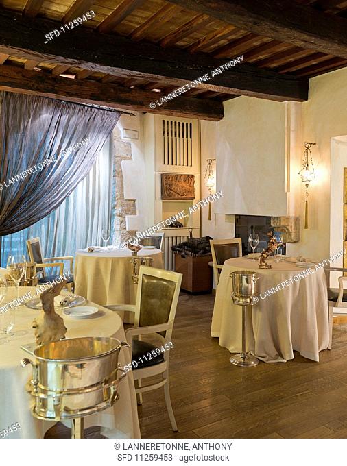 Tables laid in Restaurant Da Caino (Head Chef Valeria Piccini), Tuscany, Maremma