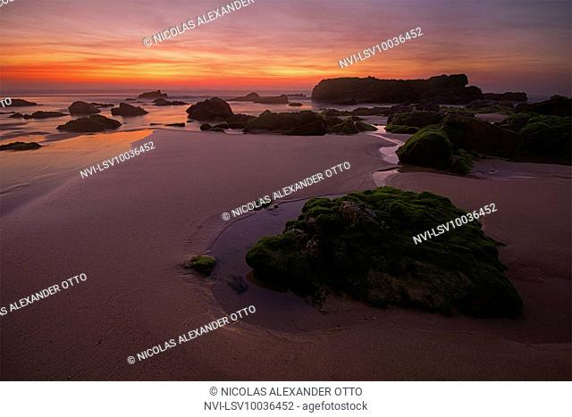 Sunset on Praia do Malhao beach, Vila Nova de Milfontes, Portugal