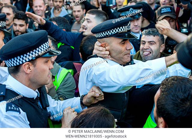 Police clash with Kurdish protesters outside the Houses of Parliament in Parliament Square, London, leading to arrests Featuring: View, Kurdish protesters