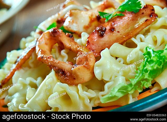 Pasta Campanelle con calamari , fried squid pasta