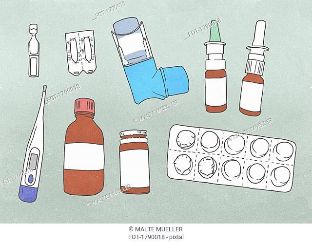 Medical supplies arranged against a gray background