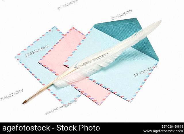 Letter and feathe isolated on the white