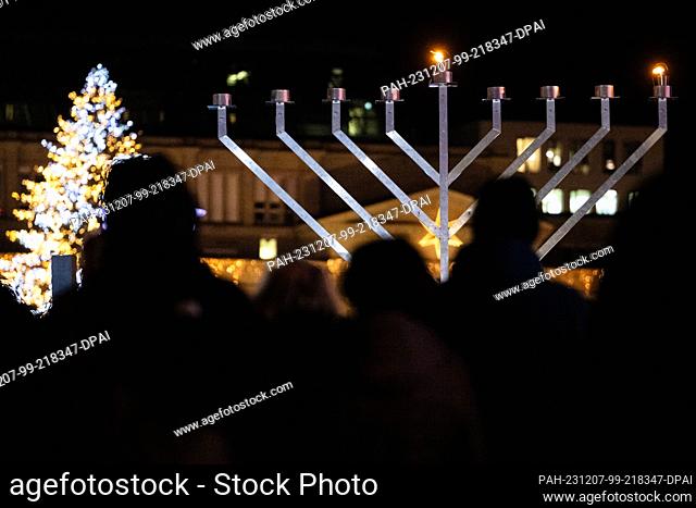07 December 2023, Baden-Württemberg, Stuttgart: A Hanukkah candelabra stands on Schlossplatz during the ceremonial lighting of the first Hanukkah light