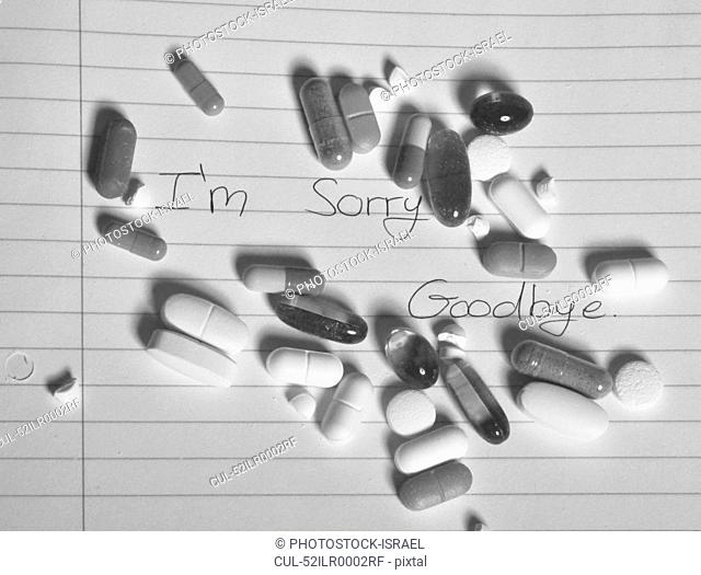 Handful of pills on suicide note