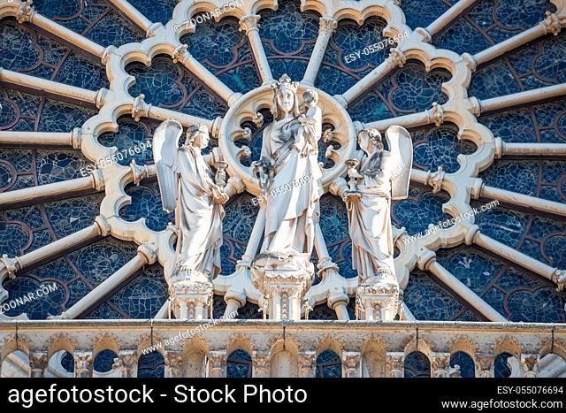 Architectural details on facade of famous cathedral Notre-Dame de Paris. Paris, France