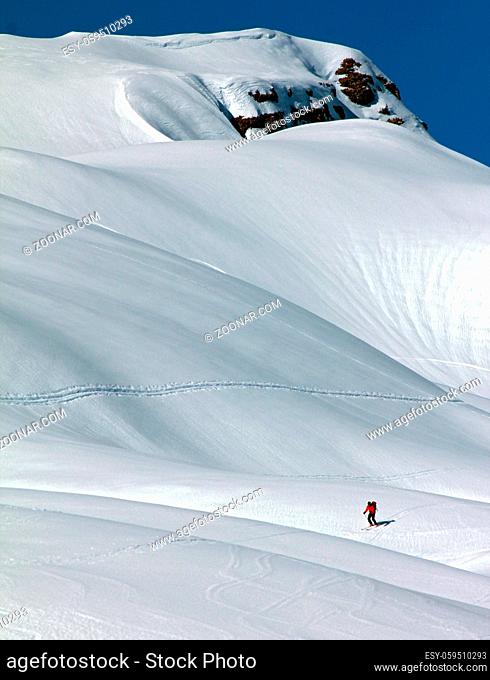 Lonely skier doing a ski tour in the bavarian alps