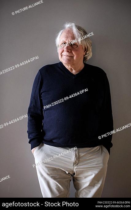 PRODUCTION - 20 March 2023, Hamburg: Peter Urban, journalist and radio commentator, smiles during a photo session at the NDR offices
