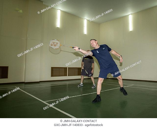 At the Cosmonaut Hotel crew quarters in Baikonur, Kazakhstan, Expedition 41 Flight Engineer Barry Wilmore of NASA tries his hand at a game of badminton Sept