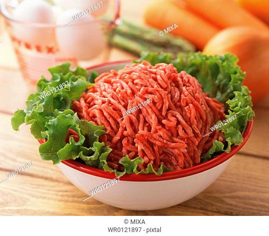 Uncooked minced beef in a bowl