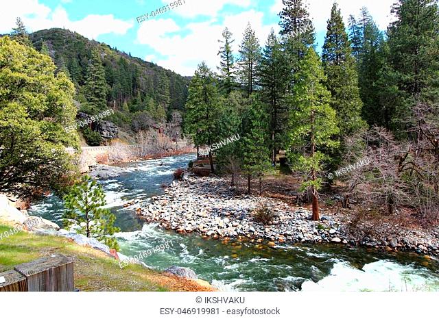 A river with rapids in the mountains in California enroute Lake Tahoe
